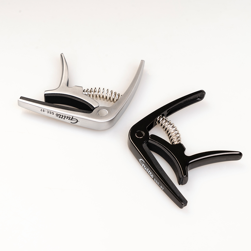 GUITTO GGC-07 Ukulele Capo Qui - Musical Instrument In English ulasan dan harga